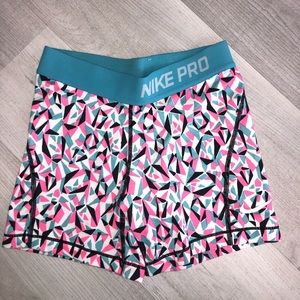 pink/teal/white/black youth nike pros